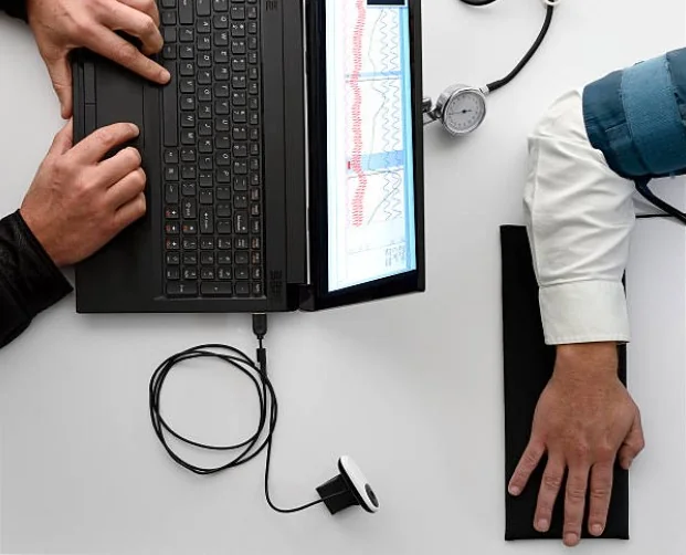 Modern polygraph testing laboratory equipment in a controlled examination room
